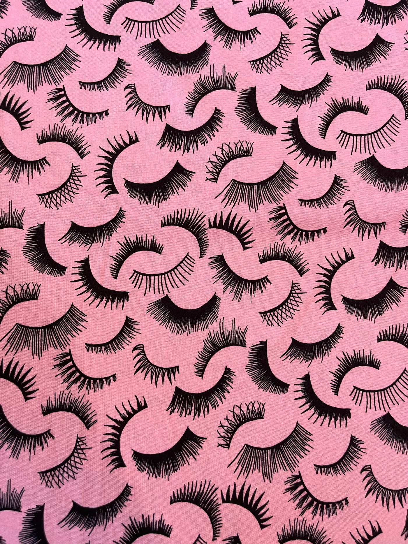 Alexander Henry Fabrics pink eye lashes Cotton Fabric by the yard