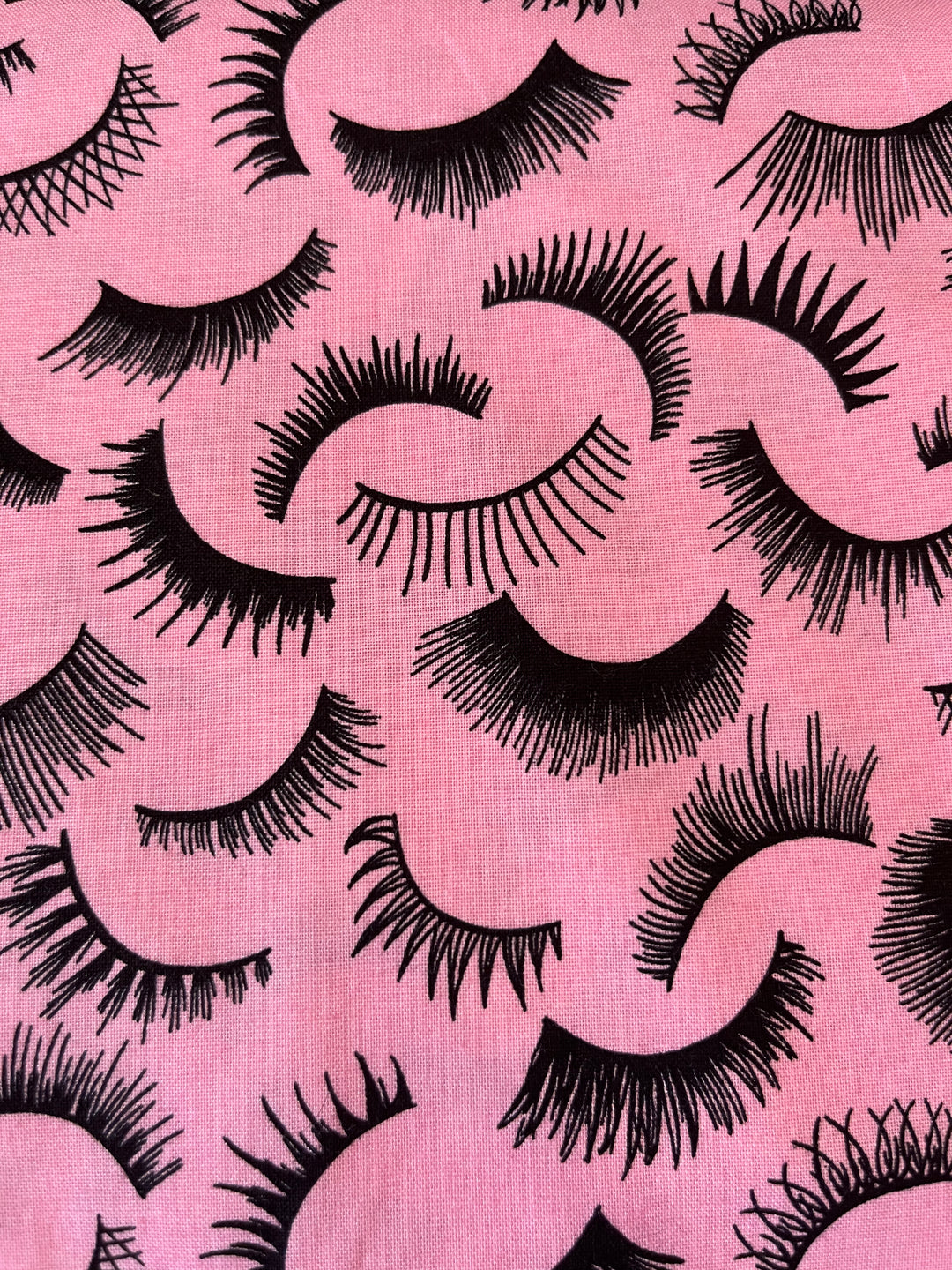 Alexander Henry Fabrics pink eye lashes Cotton Fabric by the yard